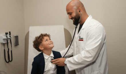 Child At Doctor’s Appointment In An Urgent Care Facility With Accepted Insurance Coverage