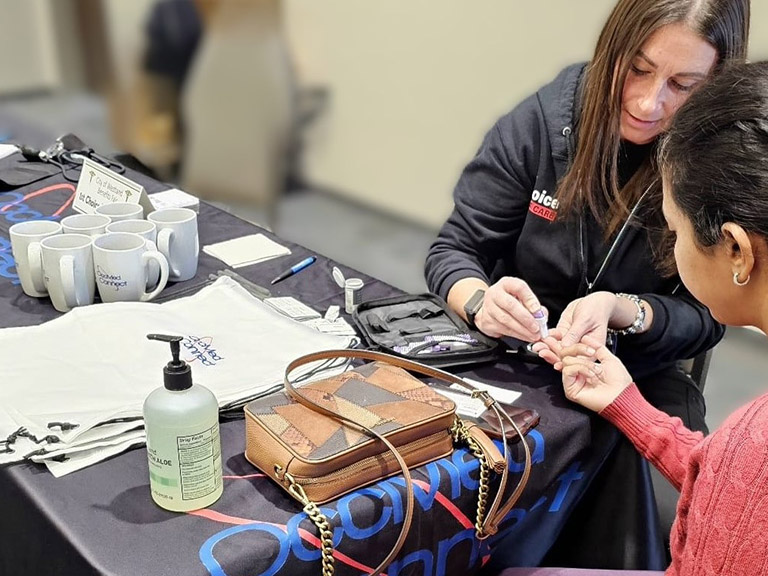 a nurse performs an occupational health exam.